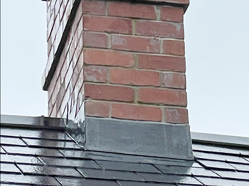 Flashing repairs on a chimney stack