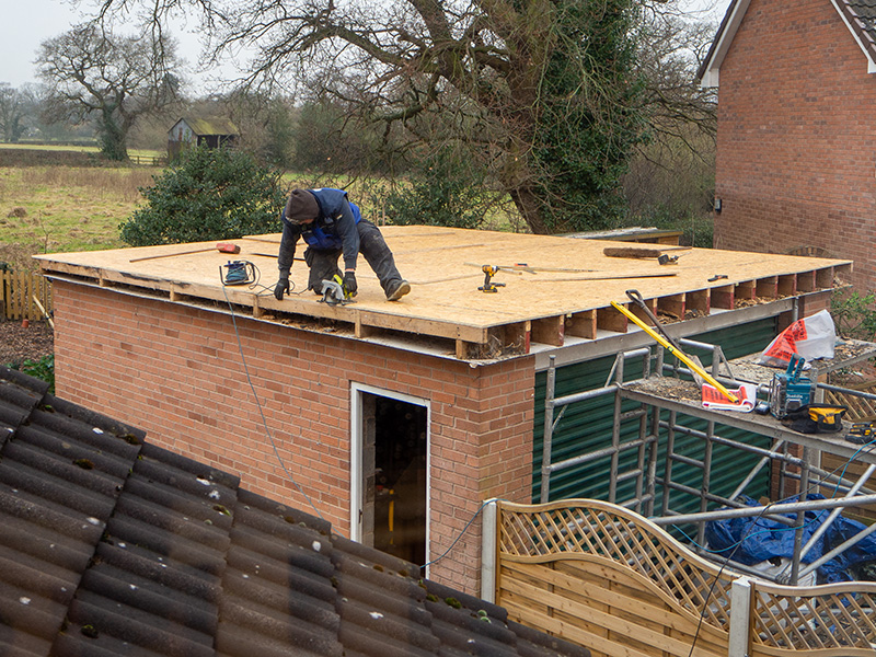 Roof being boarded with a solid base